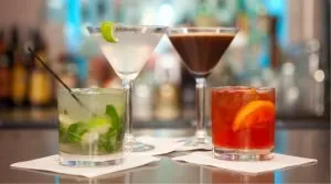 A photo of four cocktails
