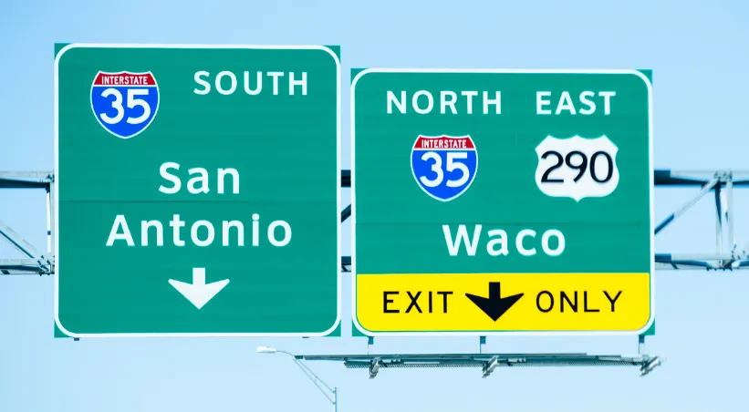 Texas Highway sign for San Antonio and Waco